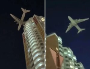 Dünyanın en büyük kargo uçağı droneden kaçarken az daha binalara çarpıyordu