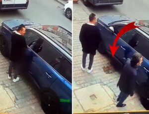 Otomobilin üzerine idrarını yaptı; sahibine saldırdı